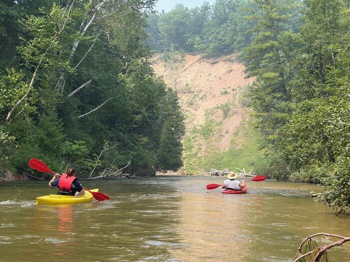 Floating the Pine past the clay banks
