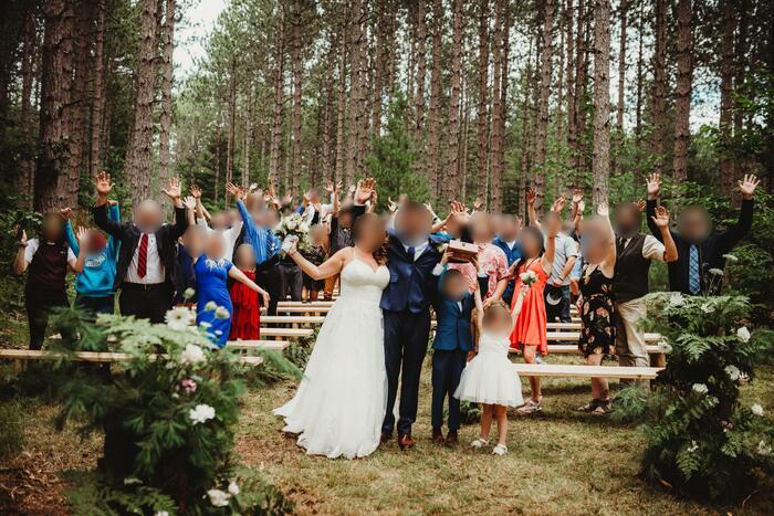 A ceremony in the pines, wedding at Edgetts Lodge, Luther Michigan